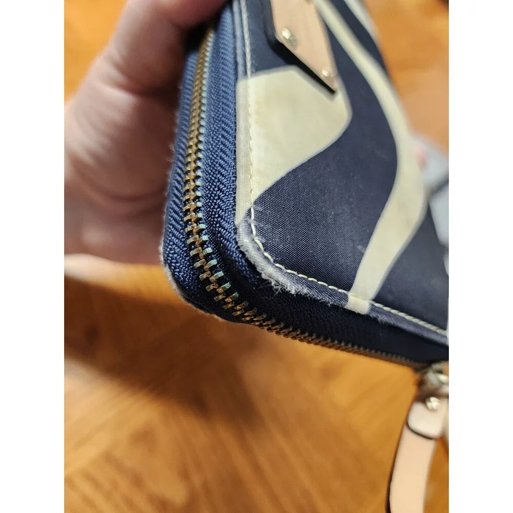 KATE SPADE BLACK WITH WHITE WAVES ZIP AROUND WALLET